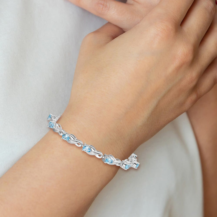 Sterling Silver Rhodium-Plated 6MM Blue Topaz Bracelet 7 Inch Womens